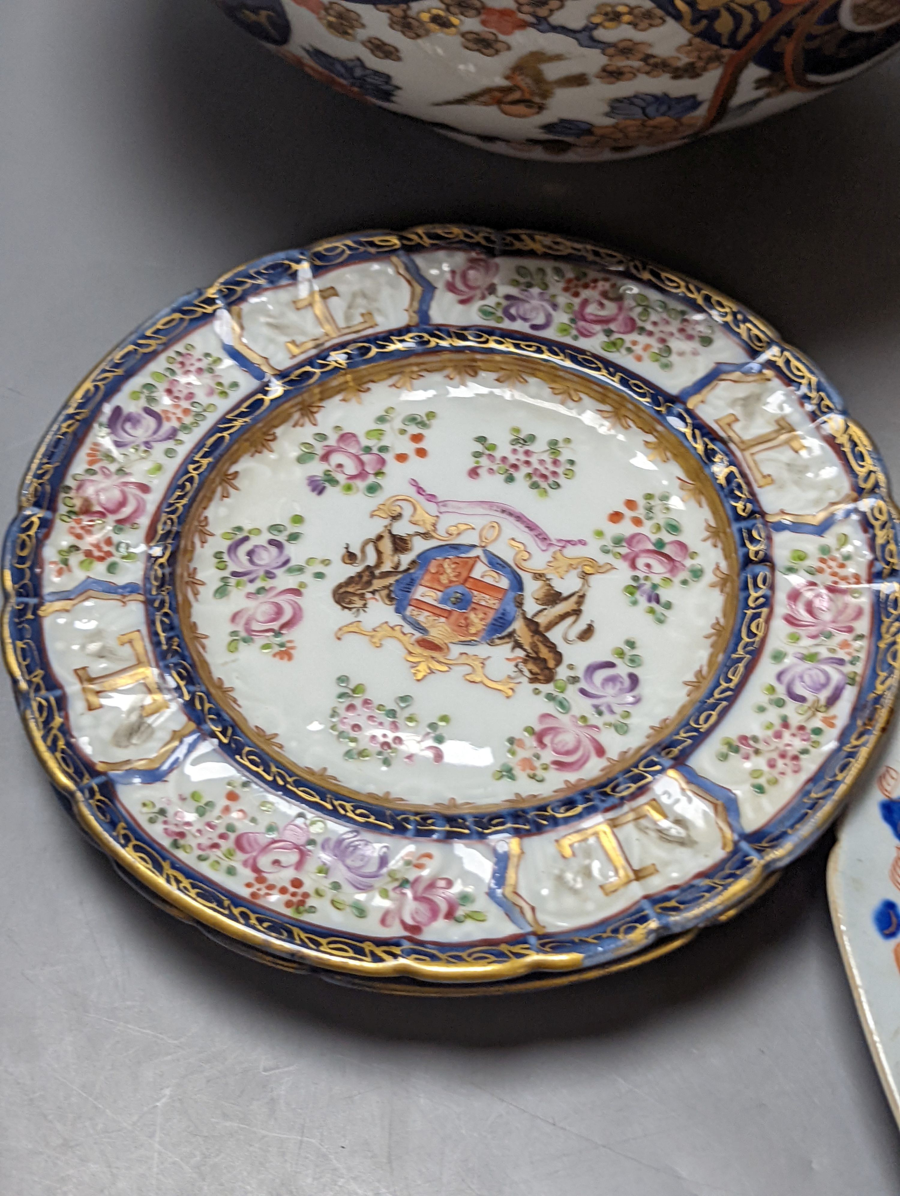 Three Masons plates, a similar platter, two armorial plates and a Japanese bowl, stoneware platter 29 cms wide.